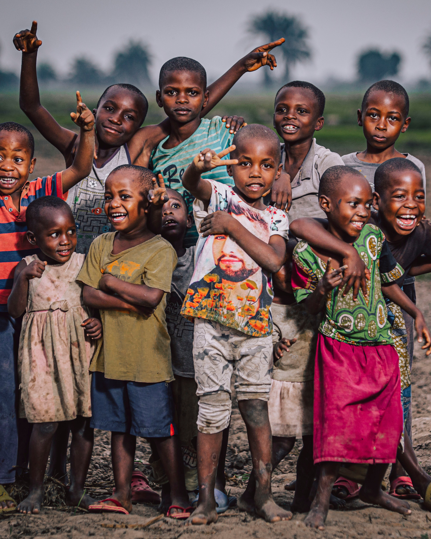 African children in village smiling at camera